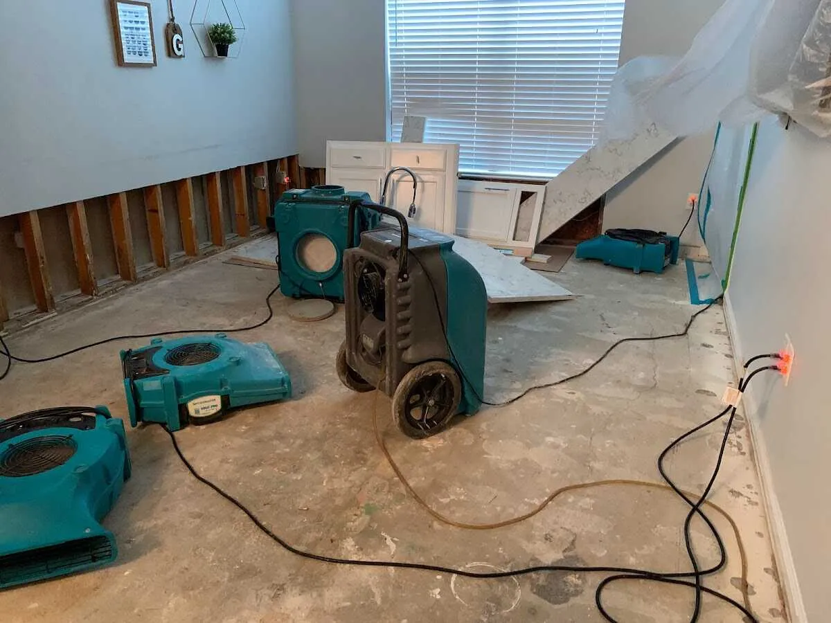 Dehumidifier in flood-cut room for Water Damage Restoration in West Orange